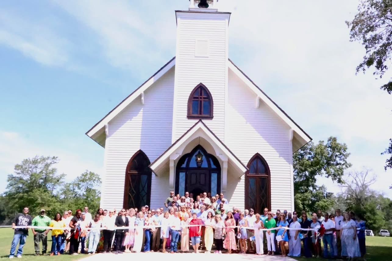 Attendees gathered in front of the Chapel to officially cut the ribbon.